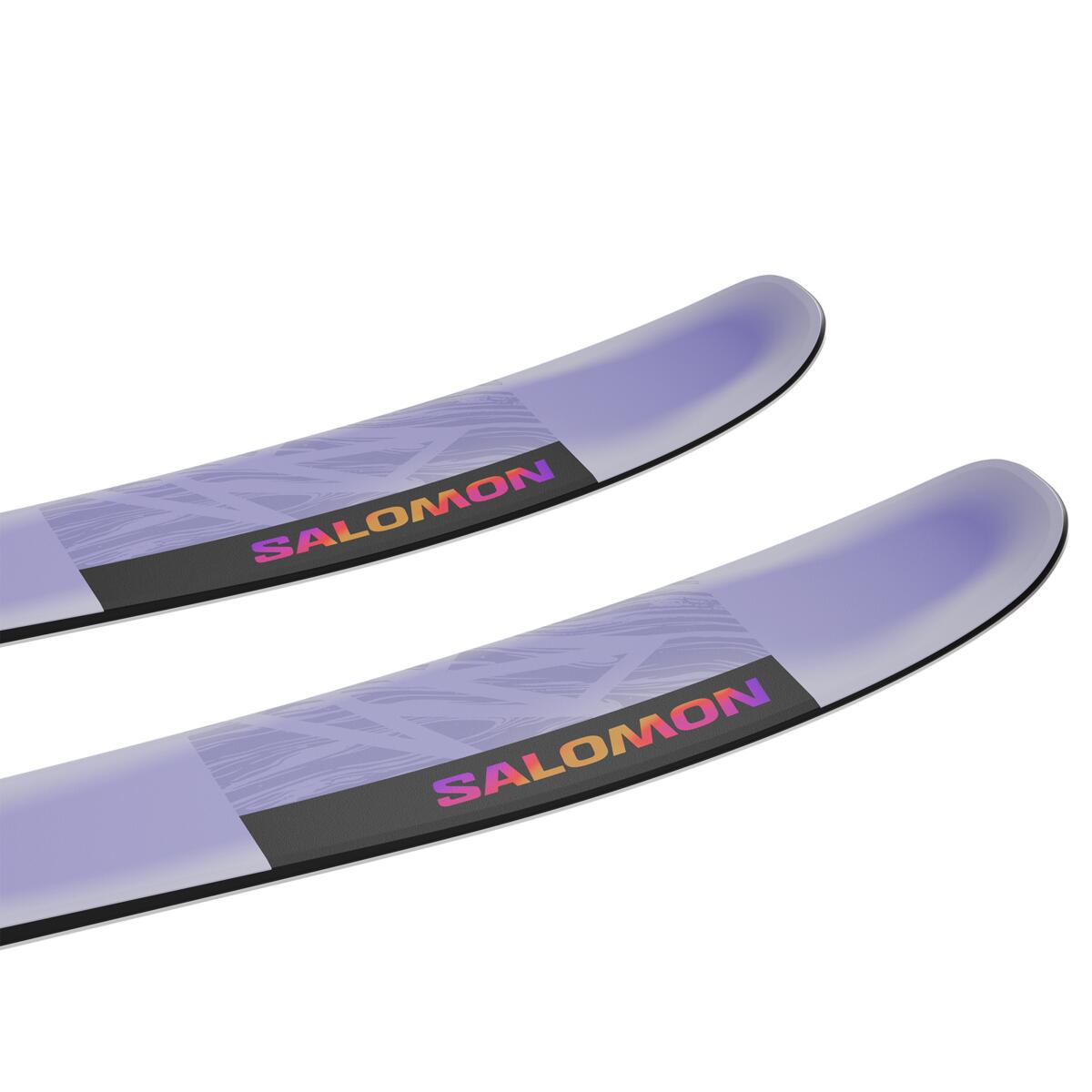 Salomon Women's QST Lumen 98 Skis 2025 - A pair of skis with a purple base color and a geometric pattern overlay, featuring a black stripe at the tip.