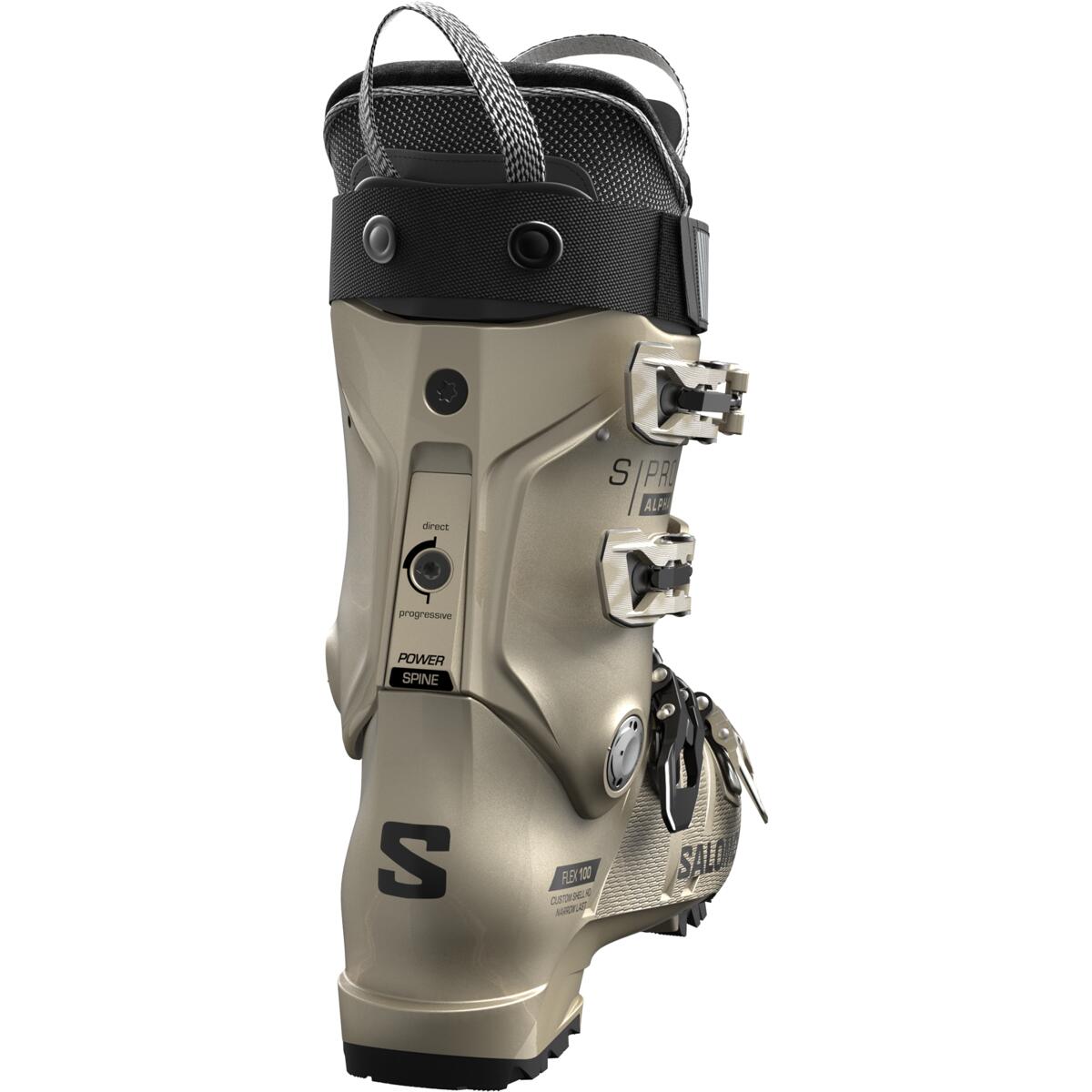 Salomon Women's S/PRO Alpha 100 GW Ski Boots 2025 - A tan ski boot with a black strap and buckle on top, featuring a textured pattern on the side.