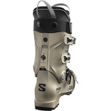 Salomon Women's S/PRO Alpha 100 GW Ski Boots 2025 - A tan ski boot with a black strap and buckle on top, featuring a textured pattern on the side.
