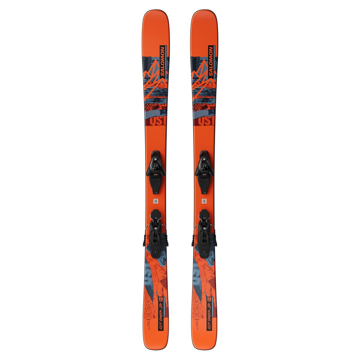 Salomon QST Spark Junior Skis with L6 GW Bindings 2025 - A pair of orange skis with a blue and black graphic design featuring mountains, trees, and snowflakes.