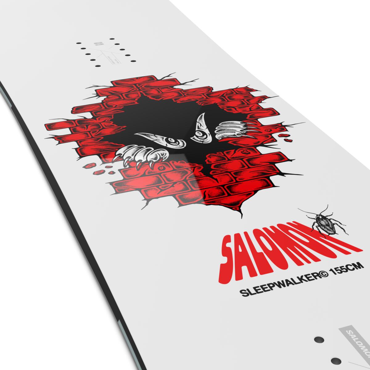 Salomon Sleepwalker Snowboard 2025 - A white snowboard with a black graphic of an owl's face peering through a hole in a red brick wall.
