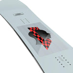 Salomon Kickback Snowboard 2025 - A light blue snowboard with a black and red checkered graphic on top of a gray background.