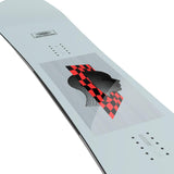 Salomon Kickback Snowboard 2025 - A light blue snowboard with a black and red checkered graphic on top of a gray background.