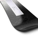 Salomon Women's Bliss Snowboard 2025 - A snowboard with a white top sheet and black base, featuring a pattern of wavy lines in light gray.