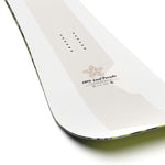 Salomon HPS Louidf Paradis 2025 - A white snowboard with a brown logo and black dots on top.