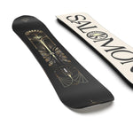 Salomon Women's Wonder Snowboard 2025 - A black snowboard with gold and silver designs on top, featuring a butterfly design in the center.