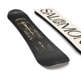 Salomon Women's Wonder Snowboard 2025 - A black snowboard with gold and silver designs on top, featuring a butterfly design in the center.
