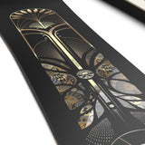 Salomon Women's Wonder Snowboard 2025 - A black snowboard with gold lettering and a white logo on top.