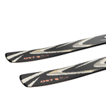 Salomon QST 94 Skis - Black skis with white and yellow accents, featuring a distinctive pattern of diagonal stripes on top.