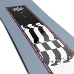 Salomon Kickback Snowboard 2026 - A black snowboard with a white logo and text on top, featuring three silhouetted skiers in white against a gray background.