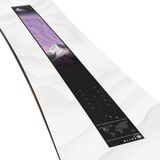 Solomon Women's Bliss Snowboard - A snowboard with a purple sky, white mountain peak and black base.