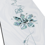 Salomon Women's Oh Yeah Snowboard 2026 - A snowboard with a black and white design, featuring a woman riding it in the background.