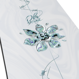 Salomon Women's Oh Yeah Snowboard 2026 - A snowboard with a black and white design, featuring a woman riding it in the background.