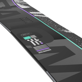 Salomon Huck Knife Pro Snowboard 2026 - A black snowboard with a purple stripe and white speckles on top.