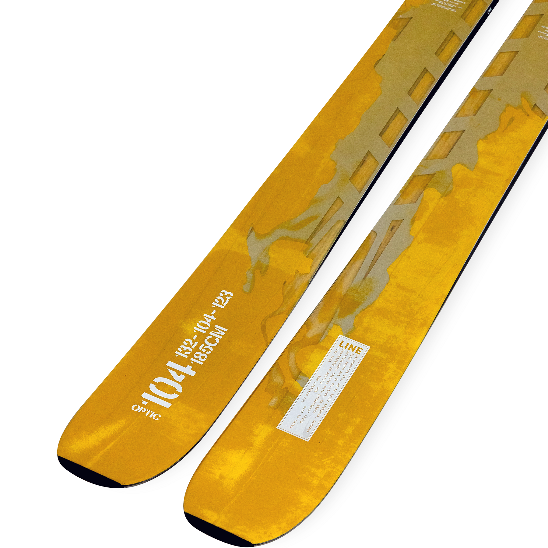 Yellow LINE skis with white markings and size text on the ski tip