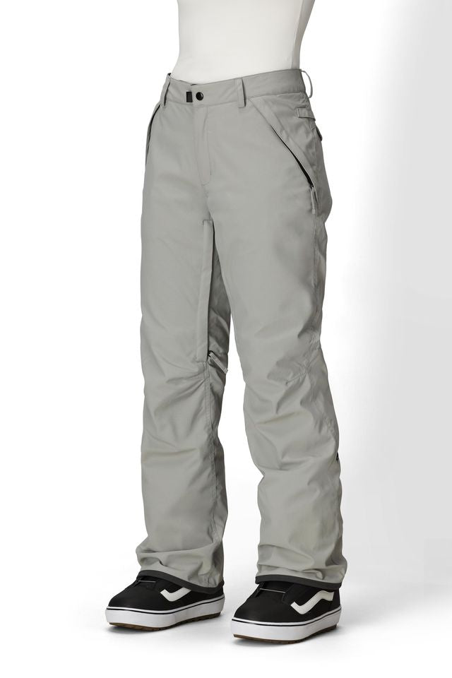 Light grey women's shell pants with cargo-style side pockets and button closure