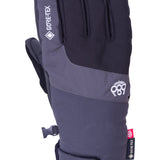 A black and gray glove with a red tag on the wrist strap, featuring the brand "GORE-TEX" and the model number "Linear Under Cuff Glove", as seen from the side view.