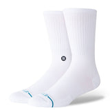 Stance Icon Crew Casual Sock 2025 - White crew socks with a small black logo on the top of one sock.
