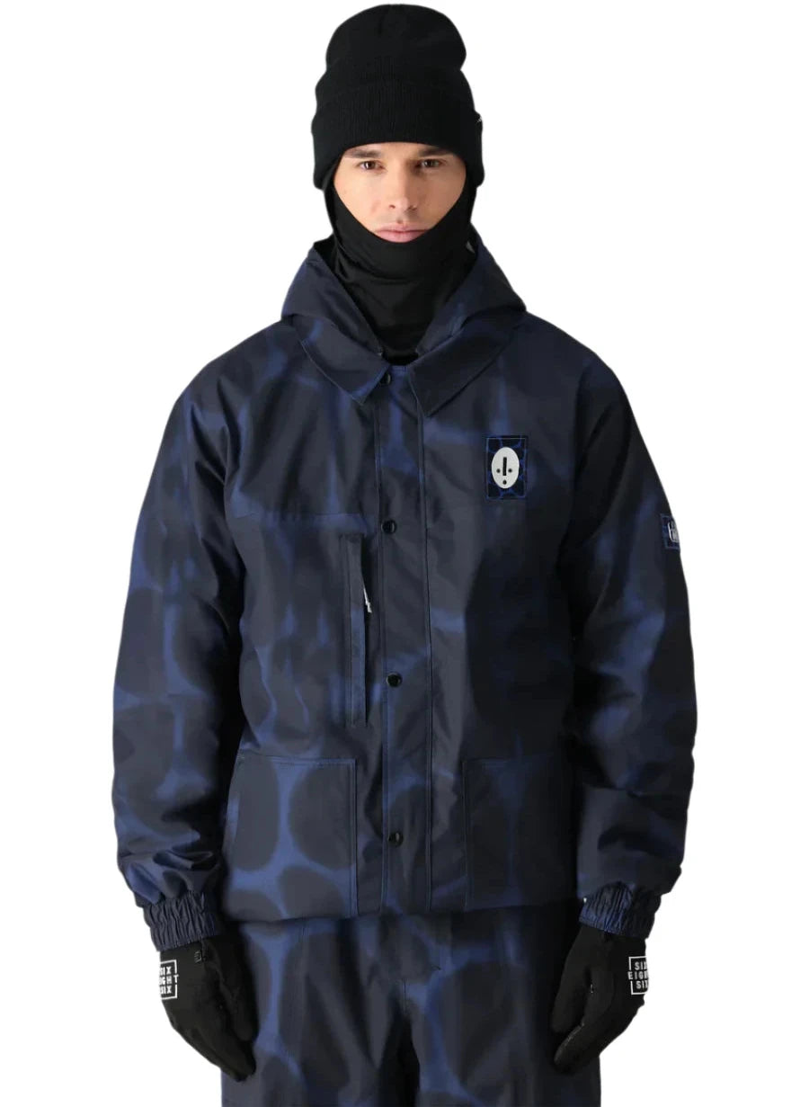 The 686 Dojo Shell Jacket is depicted in dark blue with a subtle leopard pattern and an insulated hood.