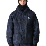 The 686 Dojo Shell Jacket is depicted in dark blue with a subtle leopard pattern and an insulated hood.