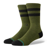 JOVEN CREW C SOCK MENS 2025 - A pair of green crew socks with black stripes and a small logo on the front.