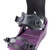 Fix Women's January Snowboard Binding 2024 - A black snowboard binding with a purple base plate and straps.