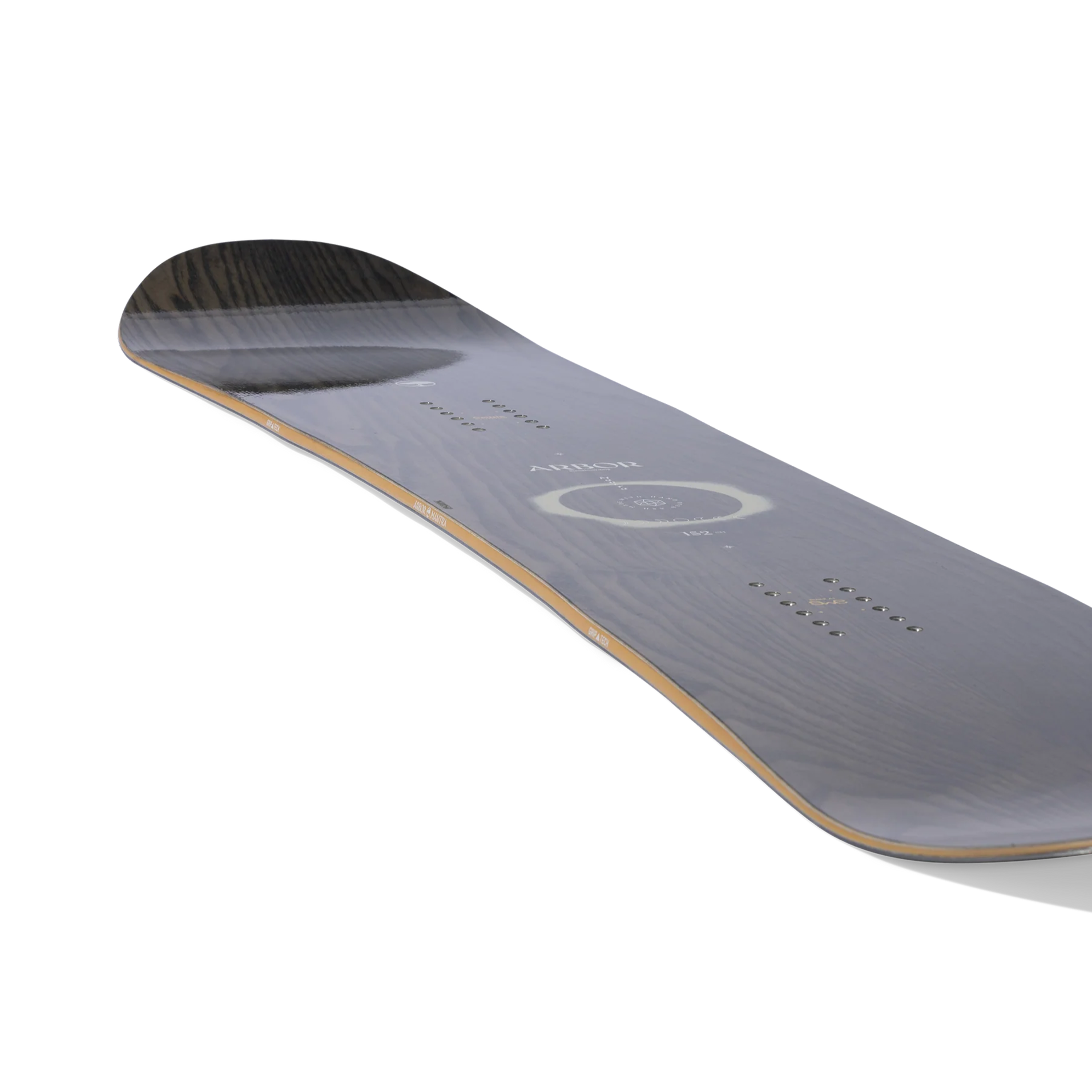 Arbor Women's Mantra Snowboard 2026 - A dark gray snowboard with a circular logo and white lettering on top, featuring a wood grain pattern on its bottom.