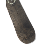 Arbor Women's Mantra Snowboard 2026 - A dark brown snowboard with a white logo and text on top, featuring a wood grain pattern.