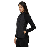 Le Bent Women's Genepi Wool Insulated Hybrid Jacket 2025 - A black jacket with a quilted pattern on the front and back, featuring a high collar and zippered pockets.