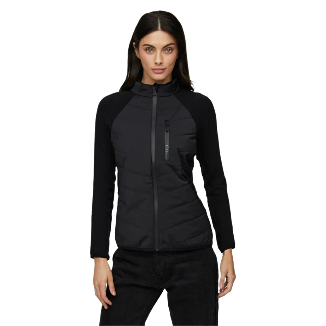 Le Bent Women's Genepi Wool Insulated Hybrid Jacket 2025 - A black jacket with a zippered front and two pockets on either side, featuring a wool insulation pattern on the chest.