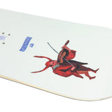 Sims Macrodose Snowboard 2025 - A white snowboard with a blue logo and black writing on top.