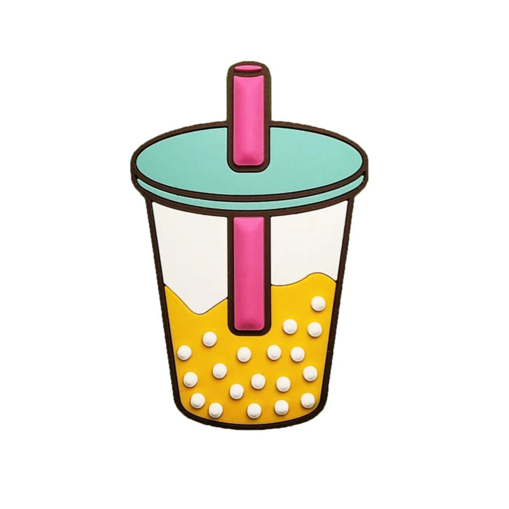 StompCharms Mango Sago Mini Stomp Pad 2025 - A yellow stomp pad with a pattern of white dots and a pink handle.