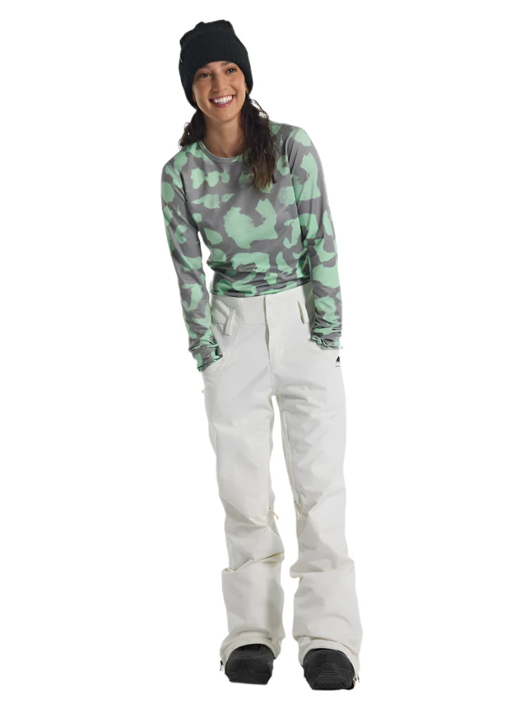 Burton Women's Marcy 2L High Rise Stretch Pants 2025 - A pair of high-rise snow pants with a light green and grey camouflage pattern, featuring a stretchy material.
