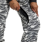 Burton Women's Marcy 2L High Rise Stretch Pants 2025 - Black snow pants with a black and white abstract pattern of lines and shapes, featuring a high rise waistband and stretchy material.