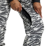Burton Women's Marcy 2L High Rise Stretch Pants 2025 - Black snow pants with a black and white abstract pattern of lines and shapes, featuring a high rise waistband and stretchy material.