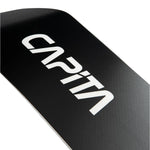 CAPiTA Mega Mercury Snowboard 2025 - A black snowboard with a white logo that reads "CAPiTA" in large letters and "Mega Mercury" in smaller letters underneath, both written in a stylized font.