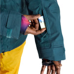 Burton Frostner 2L Jacket 2025 - A dark green jacket with a zippered chest pocket and adjustable cuffs.