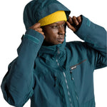 Burton Frostner 2L Jacket 2025 - A dark green jacket with a hood, featuring a zipper and two pockets on the front.