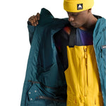 Burton Frostner 2L Jacket 2025 - A dark green jacket with a black zipper and white logo on the left chest.