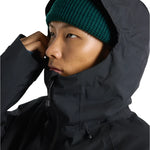 Burton Pillowline GORE-TEX Jacket 2025 - A black jacket with a hood and zipper, featuring a small "BURTON" logo on the chest.