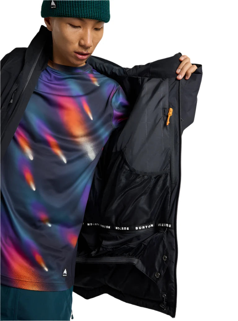 Burton Pillowline GORE-TEX Jacket 2025 - A black jacket with a white logo on the left chest and a zipper pocket on the right side.