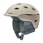Smith Men's Vantage MIPS Helmet - A tan helmet with a black strap and white logo on the side, featuring ventilation holes and a chin strap.