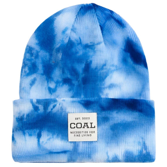 UNIFORM MID KNIT BEANIE 2024 - A blue and white tie-dye beanie with a small, rectangular patch on the front featuring the word "COAL" in black letters.