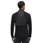 Le Bent Pramecou Wool Insulated Hybrid Jacket 2025 - A black jacket with a quilted pattern on the back and shoulders, featuring a collar and long sleeves.
