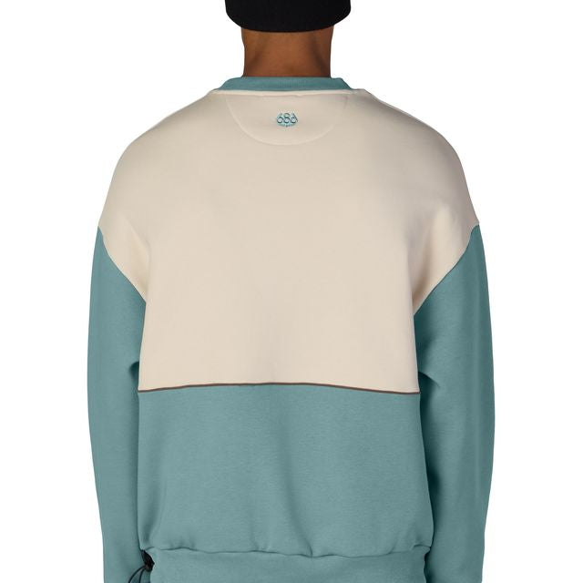 Back view colorblocked crewneck sweatshirt: beige upper and teal lower with ribbed hem