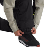 North Face Men's Freedom Insulated Pant - A pair of black insulated pants with a zippered pocket on the side.
