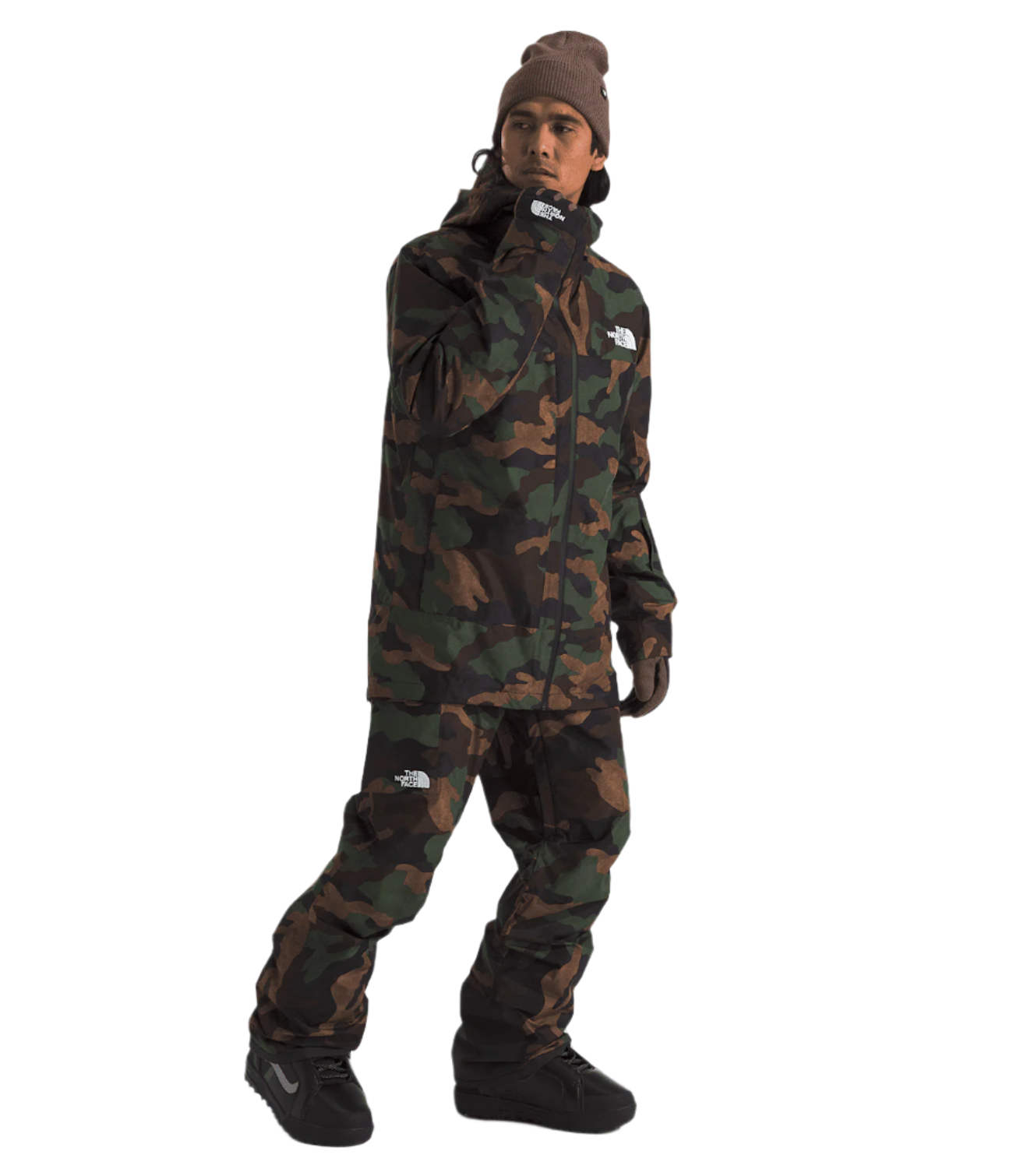 North Face Freedom Shell Pant 2025 - A dark green, camouflage-printed pant with a white logo on the left thigh.