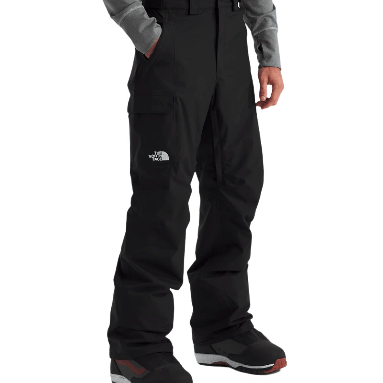 North Face Freedom Shell Pant 2025 - A pair of black pants with a white logo on the left thigh and two zippered pockets on the side.