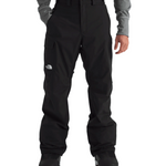 North Face Freedom Shell Pant 2025 - A pair of black pants with a white logo on the left thigh and a zippered pocket on the right leg.
