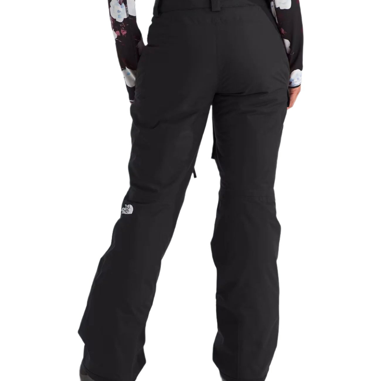 North Face Women's Freedom Insulated Pant 2025 - A pair of black insulated ski pants with a white logo on the left leg.
